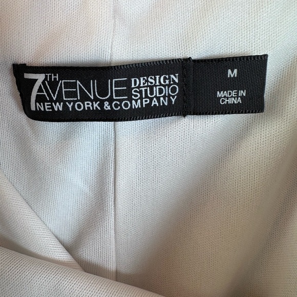 Elegant Black and White Polka Dot Pencil Skirt - Picture 4 of 4